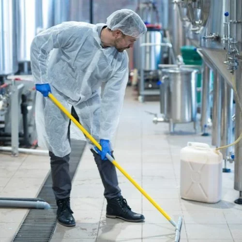 Person using Ycleaning's professional cleaner to efficiently clean floors in Calgary